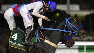 Emblem Road, under jockey Wigberto Ramos, won the $20m Saudi Cup. AP