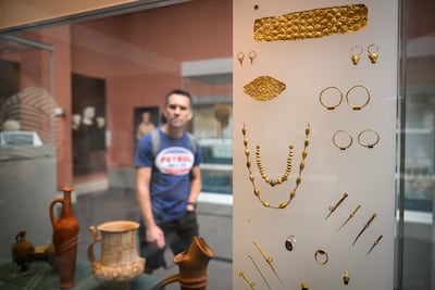 A display at the British Museum this week of Cypriot jewellery from about 1750BC. The museum launched an investigation into the theft of artefacts after discovering that stolen items were being sold on eBay for as little as £40. Getty Images