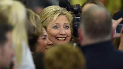 Democratic presidential hopeful Hillary Clinton greets the crowd at her primary night party. Clinton, who suffered a deflating if expected defeat, put a brave face on the loss and admitted she had some work to do as the campaign moves south. Don Emmert / AFP