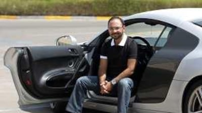 The Emirati racing driver Saif al Assam with his road car, an Audi R8. He hopes to compete at Le Mans in two or three years.