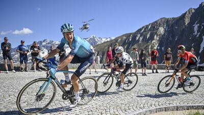 Jakob Fuglsang from Denmark leads Domenico Pozzovivo of Italy and Gino Maeder from Switzerland during the final stage of the 84th Tour de Suisse UCI Pro Tour cycling race. EPA