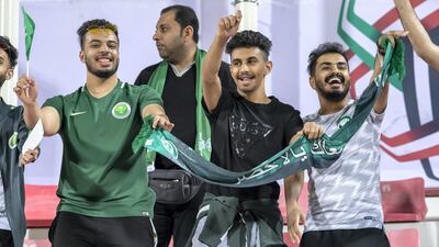 Saudi Arabia fans cheer for their team in a game against North Korea at Rashid Stadium. Their enthusiasm worked: Saudi Arabia won 4-0. Antonie Robertson / The National