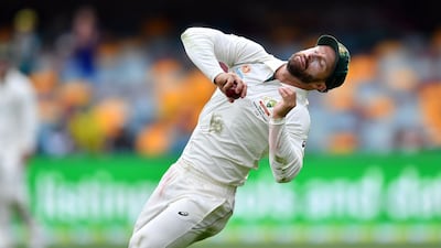 Australia's fielder Matthew Wade takes a successful catch to dismiss Pakistan's batsman Imran Khan. AFP