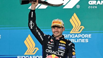 Red Bull's Max Verstappen celebrates winning the Singapore Grand Prix. AFP