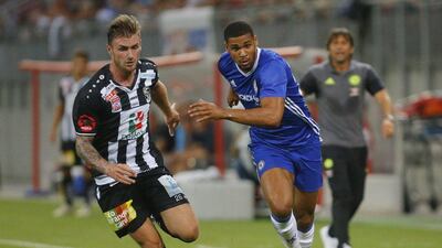 Chelsea midfielder Ruben Loftus Cheek in action against RZ Pellets’s Michael Sollbauer. Heinz-Peter Bader / Reuters
