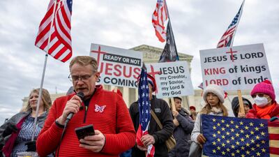 A pastor speaks at a small right-wing demonstration in support of the hundreds of people who were arrested and charged following the insurrection. Getty / AFP