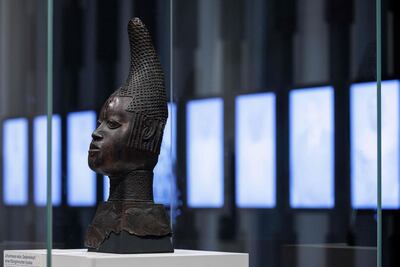 A sculpture with the title 'Uhunmwun Elao' on display with other Benin bronzes in Germany. AFP