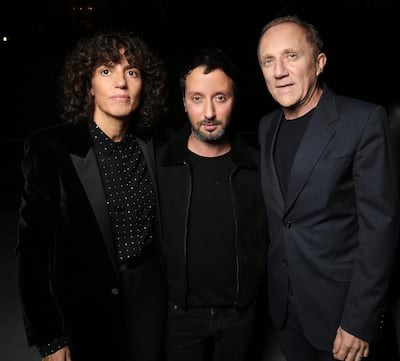 From left: Francesa Bellettini, chief executive, and Anthony Vaccarello, creative director, of Saint Laurent, with Francois-Henri Pinault, chief executive of Kering. Courtesy Saint Laurent