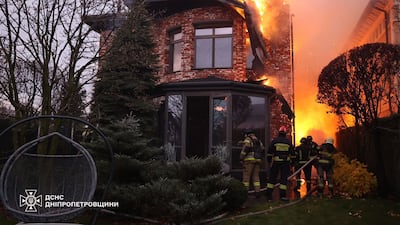 Ukrainian firefighters tackle a blaze after a Russian missile attack in Dnipro on Thursday. AFP