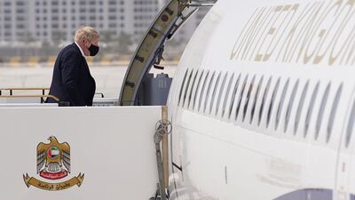 Boris Johnson boards his plane at Abu Dhabi airport after brief meetings with Emirati officials, as he heads to the Saudi capital Riyadh. Stefan Rousseau / AFP