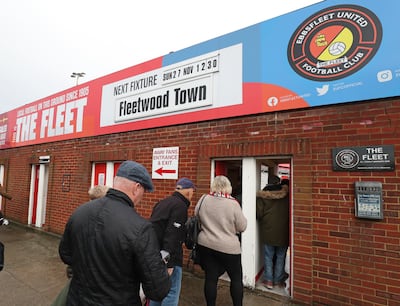 Fans queue at the turnstiles before an Ebbsfleet United match. Getty Images