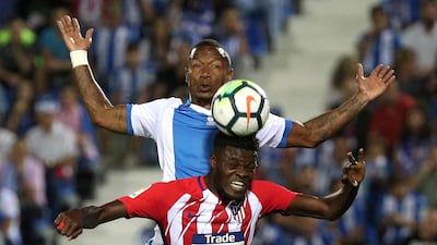 Atletico Madrid's Thomas in action with Leganes' Claudio Beauvue. Sergio Perez / Reuters