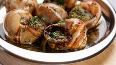 Escargot in butter and parsley sauce.