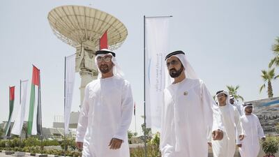 Sheikh Mohammed bin Rashid and Sheikh Mohammed bin Zayed tour the Mohammed bin Rashid Space Centre. With them is Sheikh Mansour bin Zayed, Deputy Prime Minister and Minister of Presidential Affairs. Mohamed Al Hammadi / Crown Prince Court - Abu Dhabi