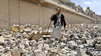 A Yemeni walks amid the rubble of the Houthi-controlled headquarters of Yemen’s defence ministry, destroyed by airstrikes carried out by the Saudi Arabia-led coalition in Sanaa on September 16. EPA