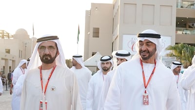 Sheikh Mohammed bin Rashid, Vice President and Ruler of Dubai, and Sheikh Mohammed bin Zayed, Crown Prince of Abu Dhabi and Deputy Supreme Commander of the UAE Armed Forces (R), attend the final day of Formula 1 Etihad Airways Abu Dhabi Grand Prix.
