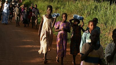 Children evading warlords in Uganda, the scene of a massacre in Denis Johnson's bleak new novel. Per-Anders Pettersson / Getty Images