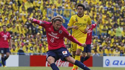 Forlan (10) attempts to score for Cerezo Osaka against Kashiwa Reysol during a J-League football match in Kashiwa on April 6, 2014. Shuji Kajiyama / AP Photo
