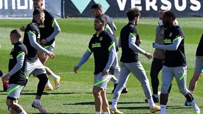 Atletico Madrid forward Luis Suarez, centre, training with teammates. AFP