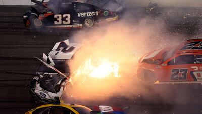 A fire breaks out during the crash at the at Daytona International Speedway. AFP