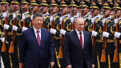 Russian President Vladimir Putin and Chinese President Xi Jinping inspect an honor guard during a welcoming ceremony at the Great Hall of the People in Beijing. Reuters