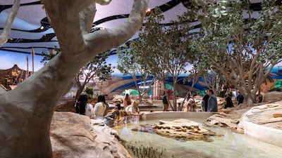 Replica mangrove trees, dhow ships and a souq