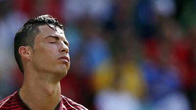 Cristiano Ronaldo reacts during Portugal's 4-0 loss to Germany on Monday at the 2014 World Cup in Salvador, Brazil. Marcos Brindicci / Reuters / June 16, 2014