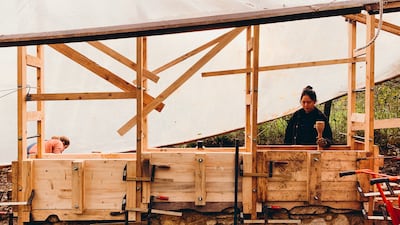 Architects Amina Yusupova and Thanatcha Cholpradit working on Hooke Garden, winner of The Rammed Earth Pavilion competition. All photos: Buildner