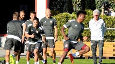 Jupp Heynckes, right, puts his Bayern Munich players through their paces at Saebener Strasse training ground. Sebastian Widmann / Getty Images