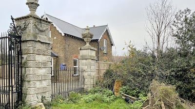 The gates and gatehouse of Stanwell Place. Paul Carey/The National