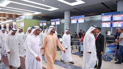 Workers are stunned to see Sheikh Mohammed, Sheikh Hamdan and Sheikh Saeed walk through Dubai International Airport. Wam