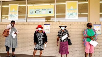 People wait in line to receive the Johnson & Johnson vaccine at a clinic run by Healthcare Network in Immokalee, Florida. AP Photo