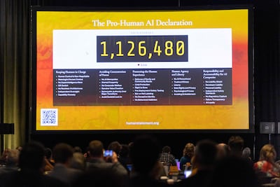 Audience members at the Pro-Human Assembly in Washington on September 15 watch as the number of signatories rises. Getty Images via AFP