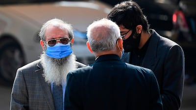 Ahmed Omar Saeed Sheikh's father Saeed Sheikh (L) leaves the Supreme Court building in Islamabad on January 28, 2021. AFP