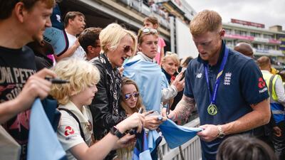 Ben Stokes signs autographs during the England ICC World Cup Victory Celebration at The Kia Oval in London, England. Getty Images