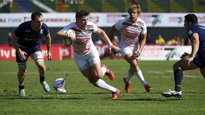 England's Phil Burgess in action against Scotland during the Dubai Sevens quarter-final on Sunday. Martin Dokoupil / AP Photo / December 3, 2016