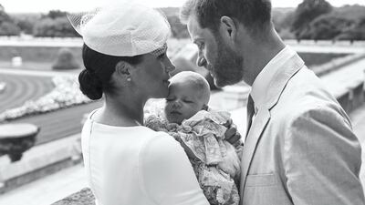 This official christening photograph released by the Duke and Duchess of Sussex shows Prince Harry and Meghan with Archie at Windsor Castle on July 6, 2019. Reuters
