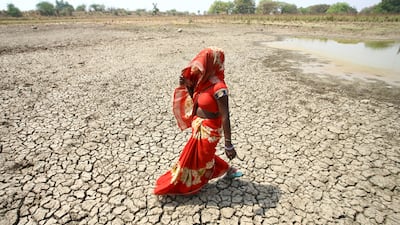 Cracked mud at the bottom of a dry pond on a hot day in Mauharia village in the northern state of Uttar Pradesh. Reuters