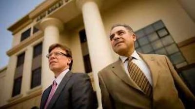 Professor James Stuart Pounder, left, and Dr Nabil Ibrahim of Abu Dhabi University at the newly opened campus.