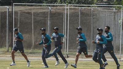 Pakistan's players warm up before their practice session in Lahore. AFP