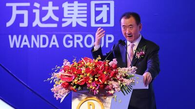 China's Wanda Group chairman Wang Jianlin speaks during an agreement ceremony in Beijing. Wu Hong / EPA