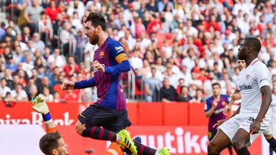 Messi's efforts have helped move Barcelona 10 points clear at the top. EPA