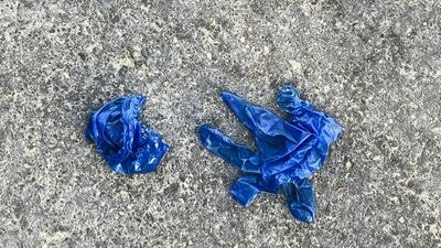 Discarded gloves, such as these in Dubai's Al Barsha, are becoming an environmental hazard. Reem Mohammed / The National