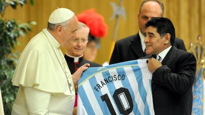 Pope Francis meets Diego Maradona at the Vatican on September 1, 2014. Getty Images