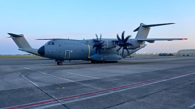 The aircraft carrying Mr Vandecasteele, 42, lands in Brussels. EPA