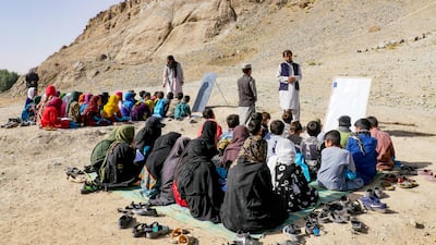 Afghan children attend an open-air school in Firozkoh, Ghor province. AFP