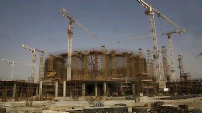 Orascom is exposed to the UAE market through its stake at BESIX Group, which helped construct the Ferrari World theme park. Nicole Hill / The National