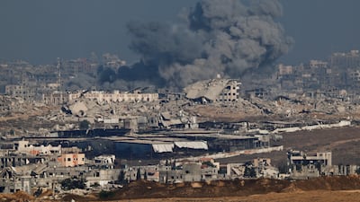 Smoke rises in Gaza after an Israeli air strike. Reuters