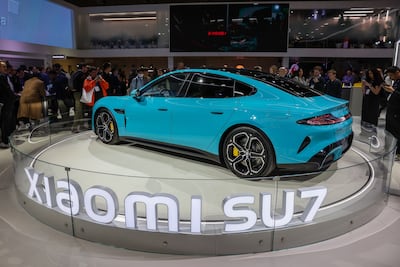 The SU7 electric vehicle at the Xiaomi booth on the opening day of the Mobile World Congress. Bloomberg