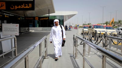 Now out of the airport, Thamer heads for the taxi rank and on to Downtown Dubai.